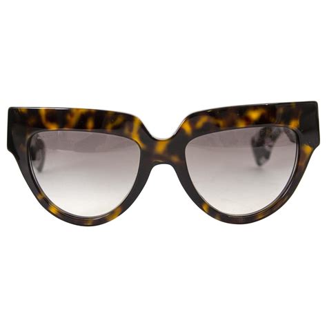 Prada Poeme Black And Tortoise Flower Sunglasses 